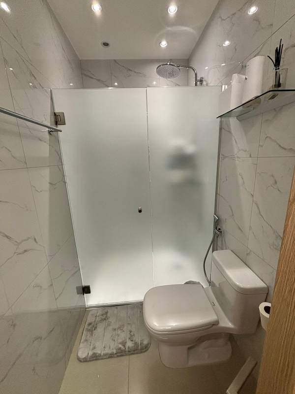 Fully equipped contemporary kitchen with granite countertops at PH South Coast Panama City