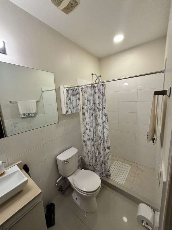 Modern master bedroom with balcony access and views, PH South Coast Panama