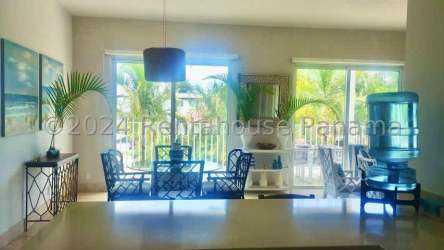 Open living and dining area with large windows and ocean view Puntarena Buenaventura Panama