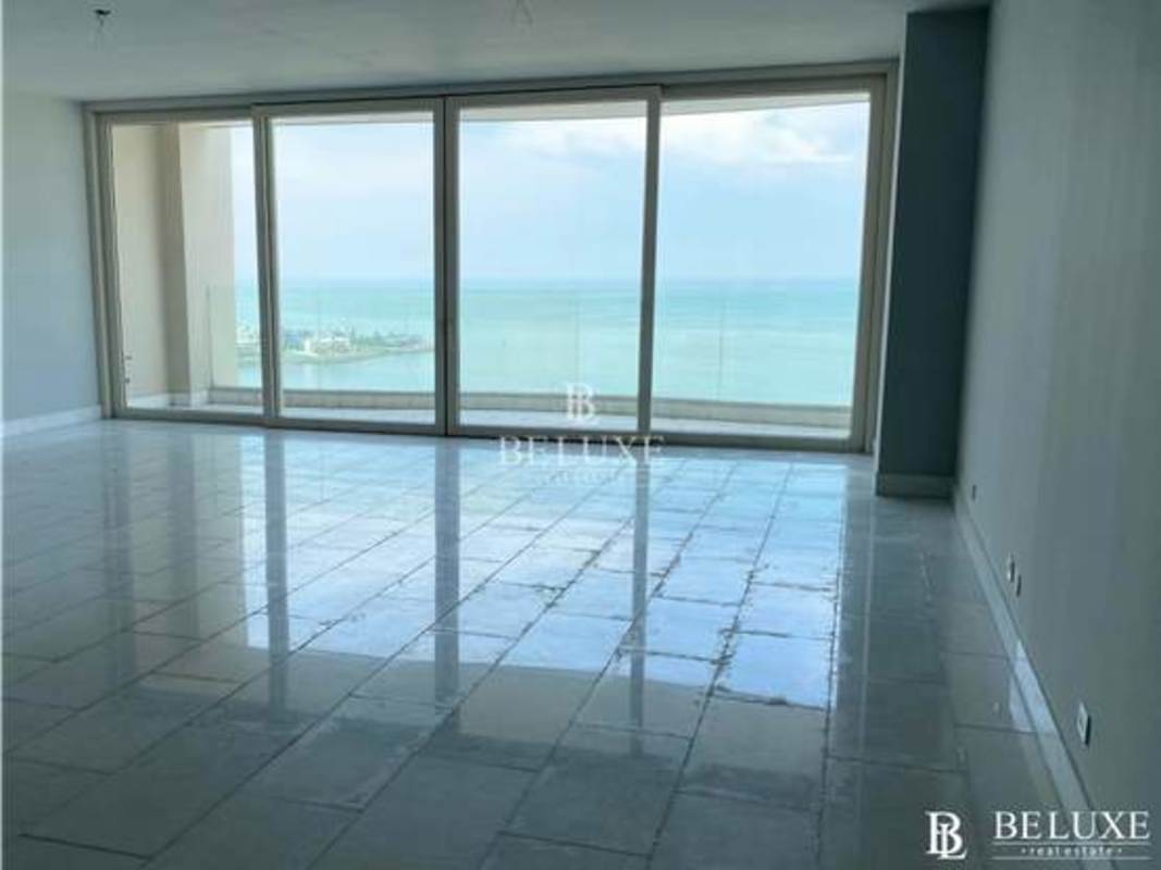 Modern kitchen with marble countertops, island and sleek cabinetry in PH The Towers Panama City