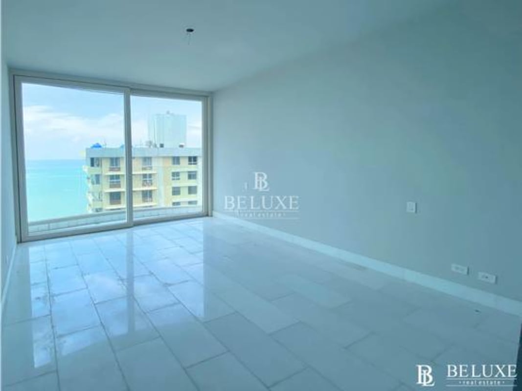 Infinity rooftop swimming pool with panoramic ocean and skyline views PH The Towers Panama City