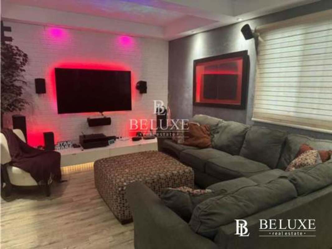 Kitchen with granite countertops and appliances at house in Versalles Panama
