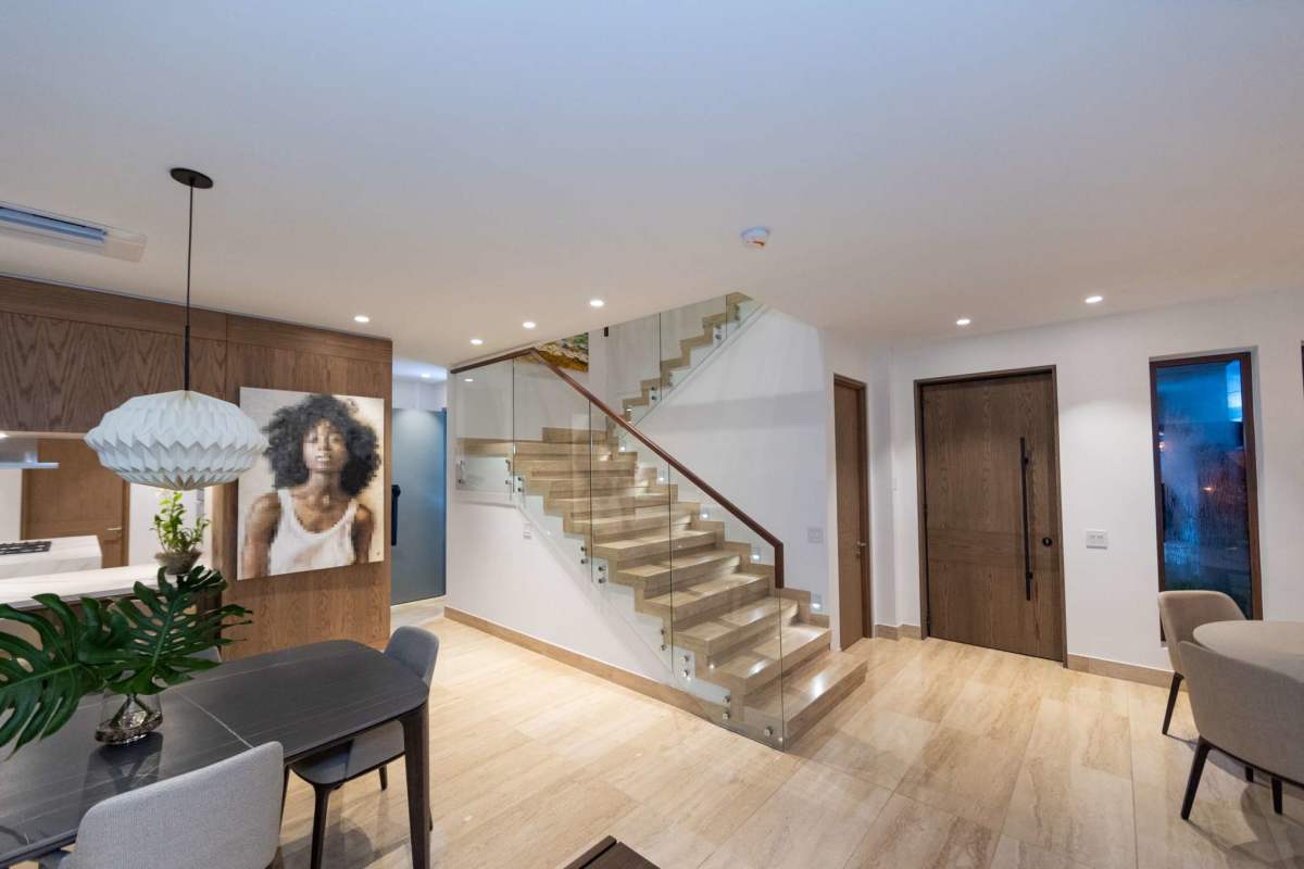 Elegant interior entrance hall with dining area at The Woods Panama