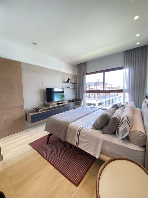 Bright bedroom with modern décor and large windows Santa María Panama