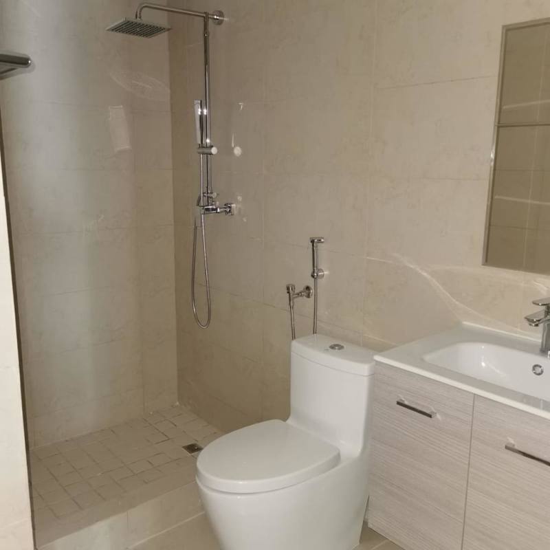 Kitchen with granite countertops, stainless steel appliances, porcelain tile floors at PH Lumiere Costa del Este in Panama City