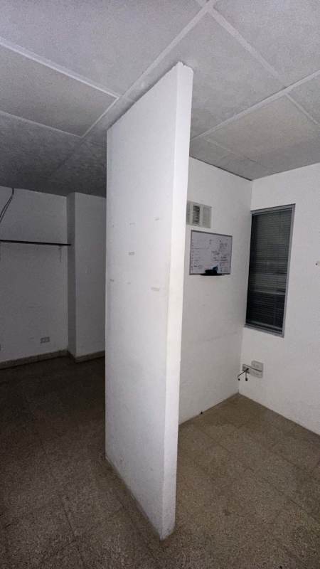 Open plan space with partition and tiled floor in retail office for rent Via Argentina Panama