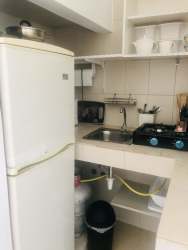 Furnished living dining space with sofa and table in rental apartment Costa Verde Panama