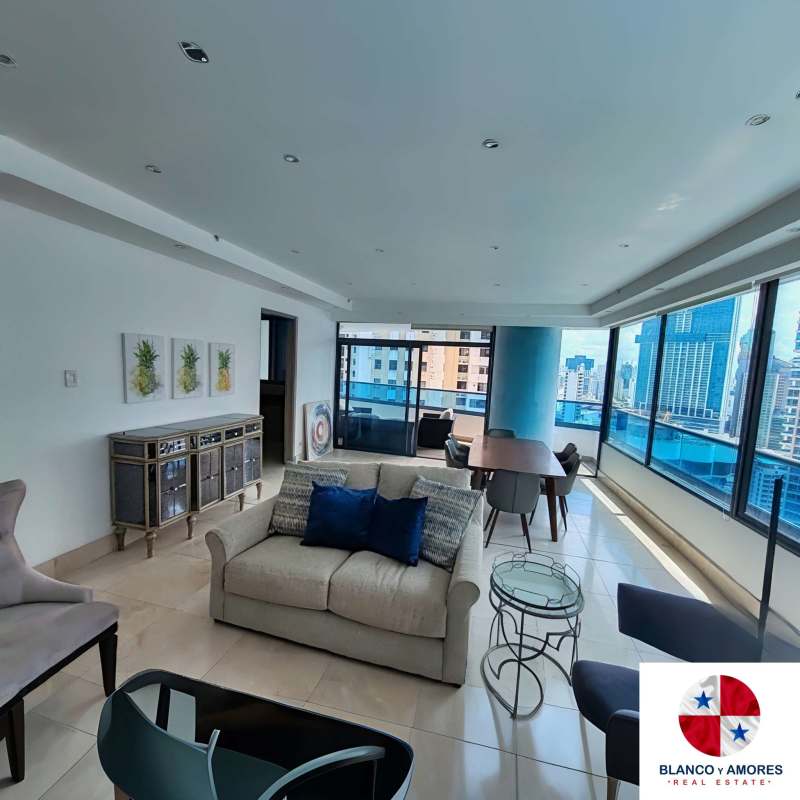 Modern dining space with large windows and city views Punta Paitilla luxury apartment Panama