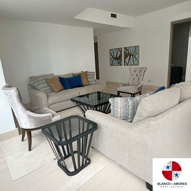 Elegant furnished living area with panoramic ocean views in luxury Punta Paitilla condo Panama City