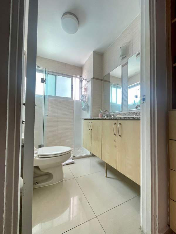 Modern bathroom with glass shower enclosure in PH Sevilla Costa del Este Panama