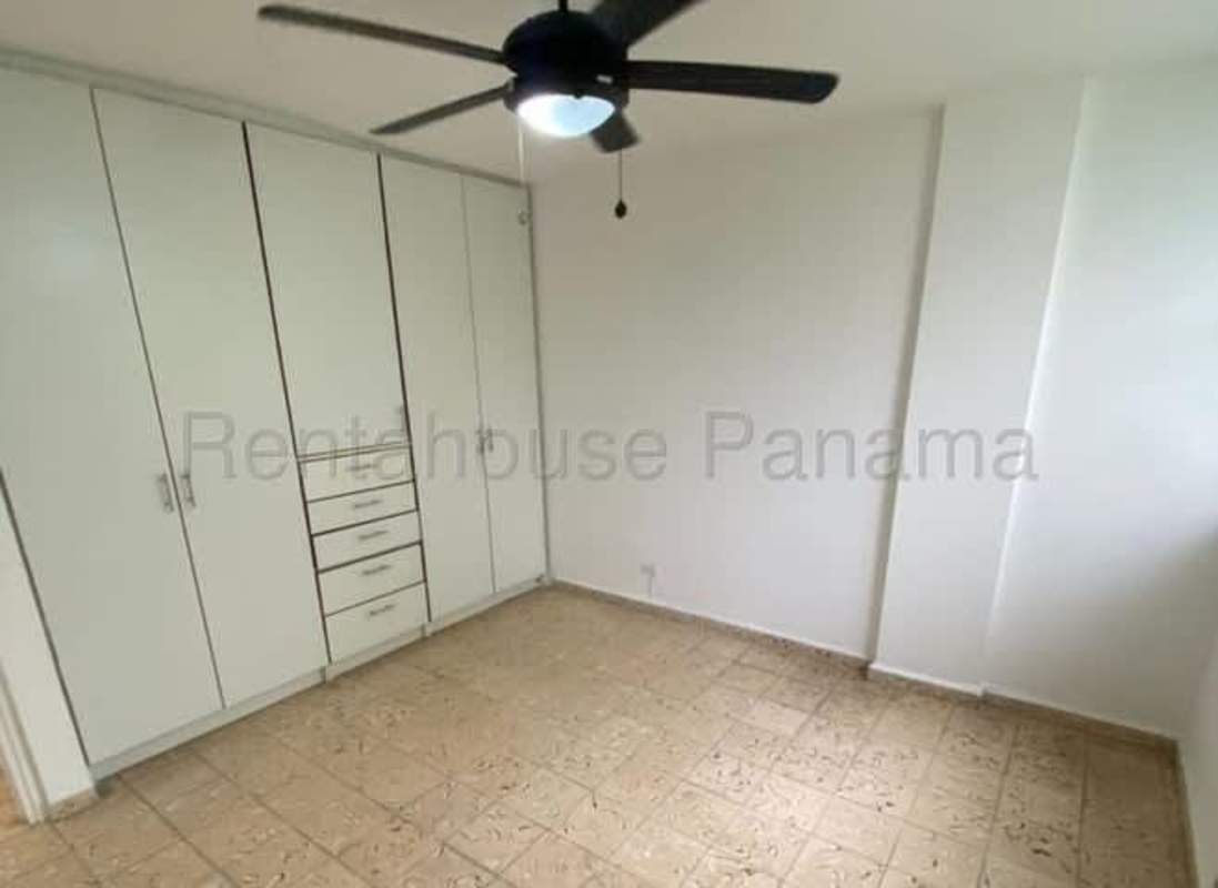 Laundry room with jalousie windows, utility sink in Parque Lefevre apartment Panama
