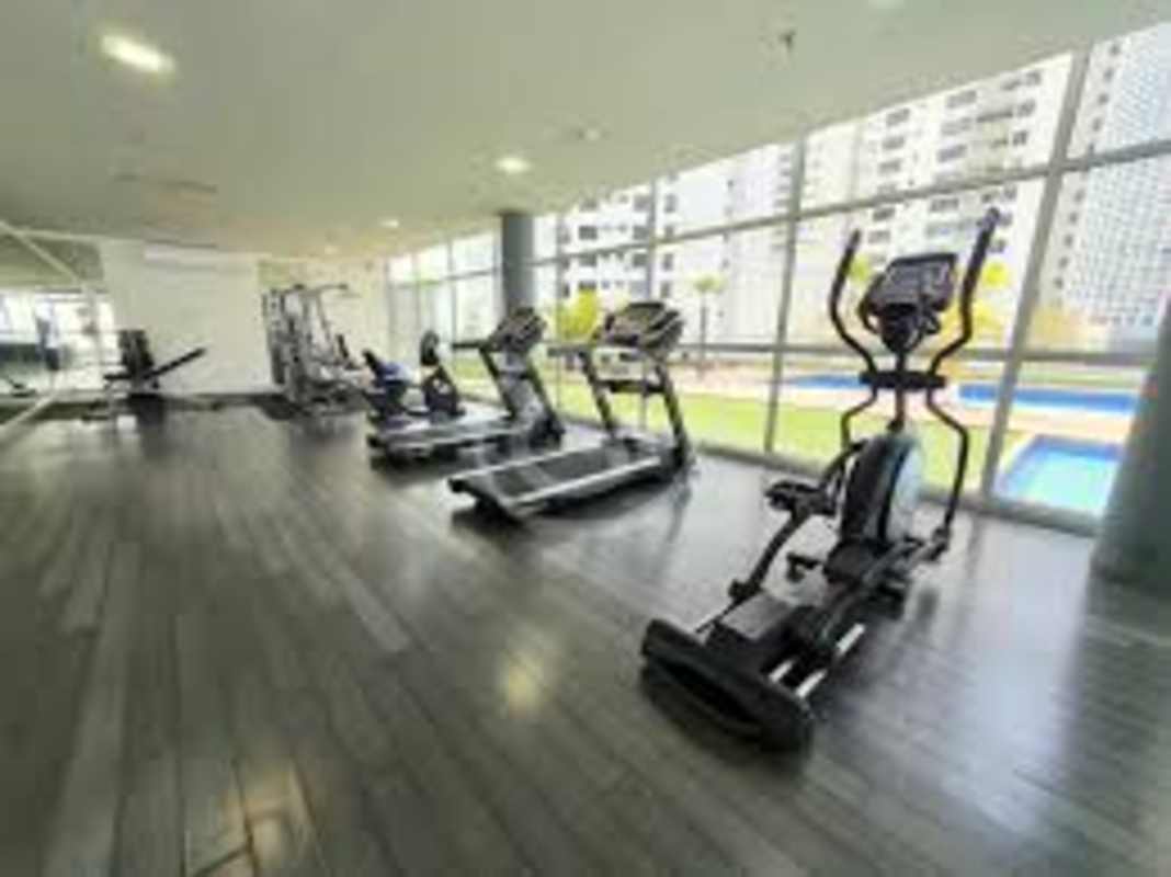 Contemporary kitchen with granite countertops, stainless appliances at PH Colores de Bellavista Panama City