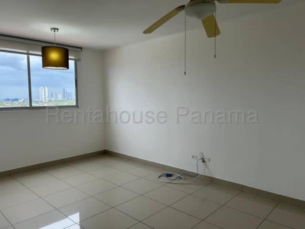 Modern living area with large window, ceiling fan, tile floors, Parque Lefevre Panama