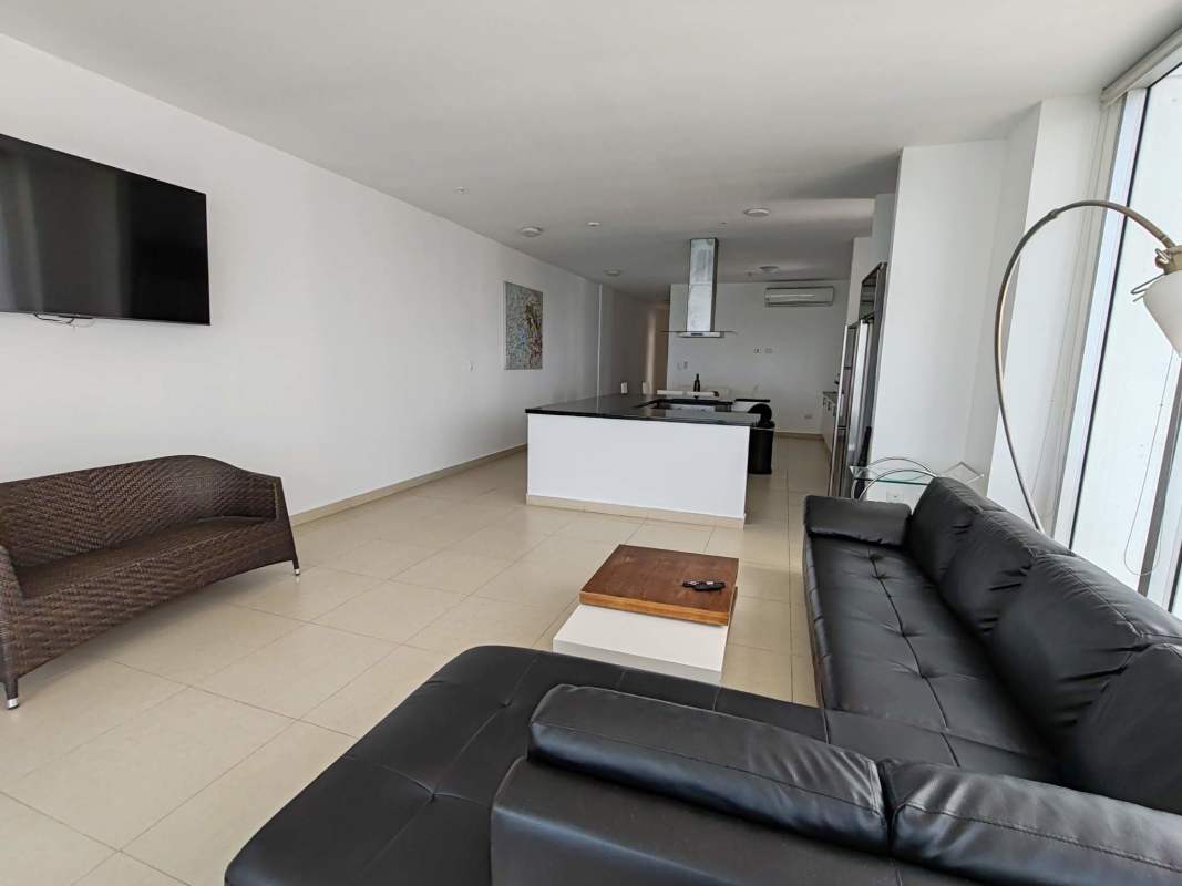 Modern kitchen with appliances and granite countertops in PH Rivage Tower Panama City oceanfront apartment