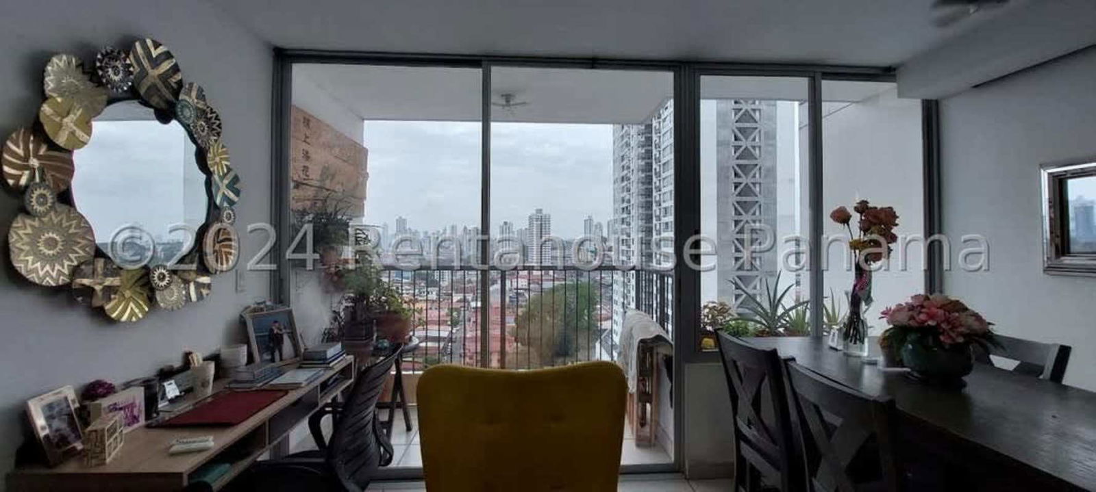 Living space with large windows and balcony access PH Lefevre 75 Panama