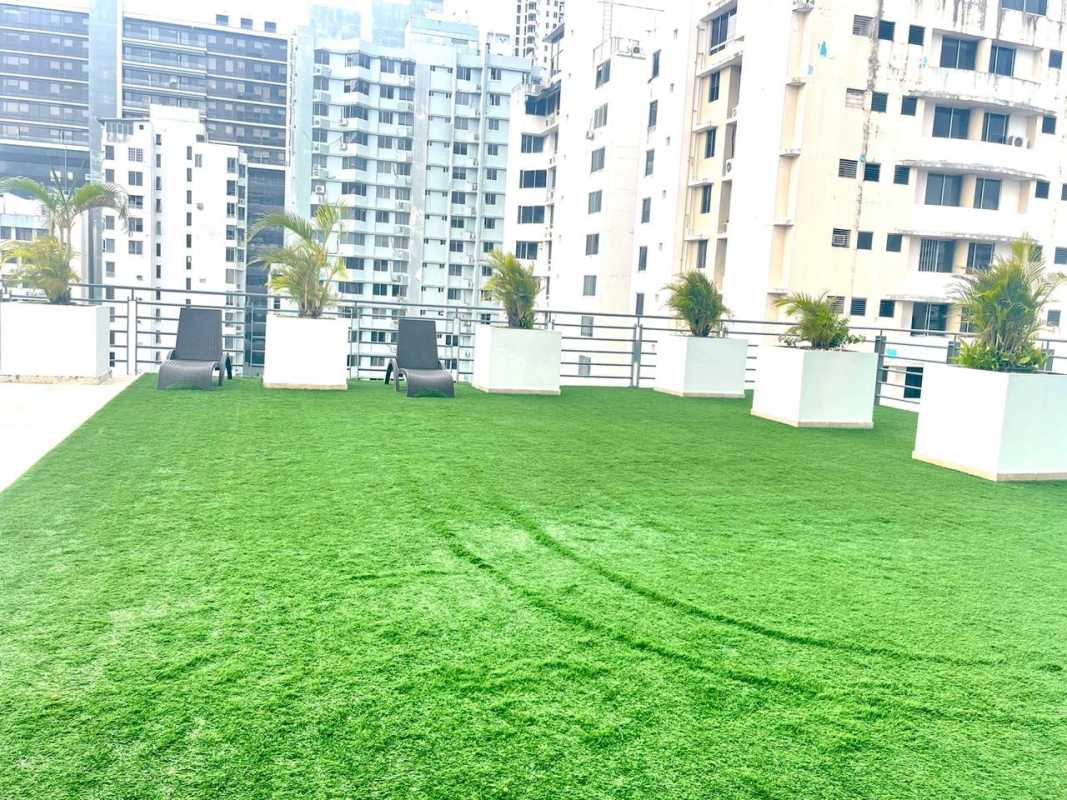 Apartment building rooftop green lounge area PH Famagosta Loft San Francisco Panama