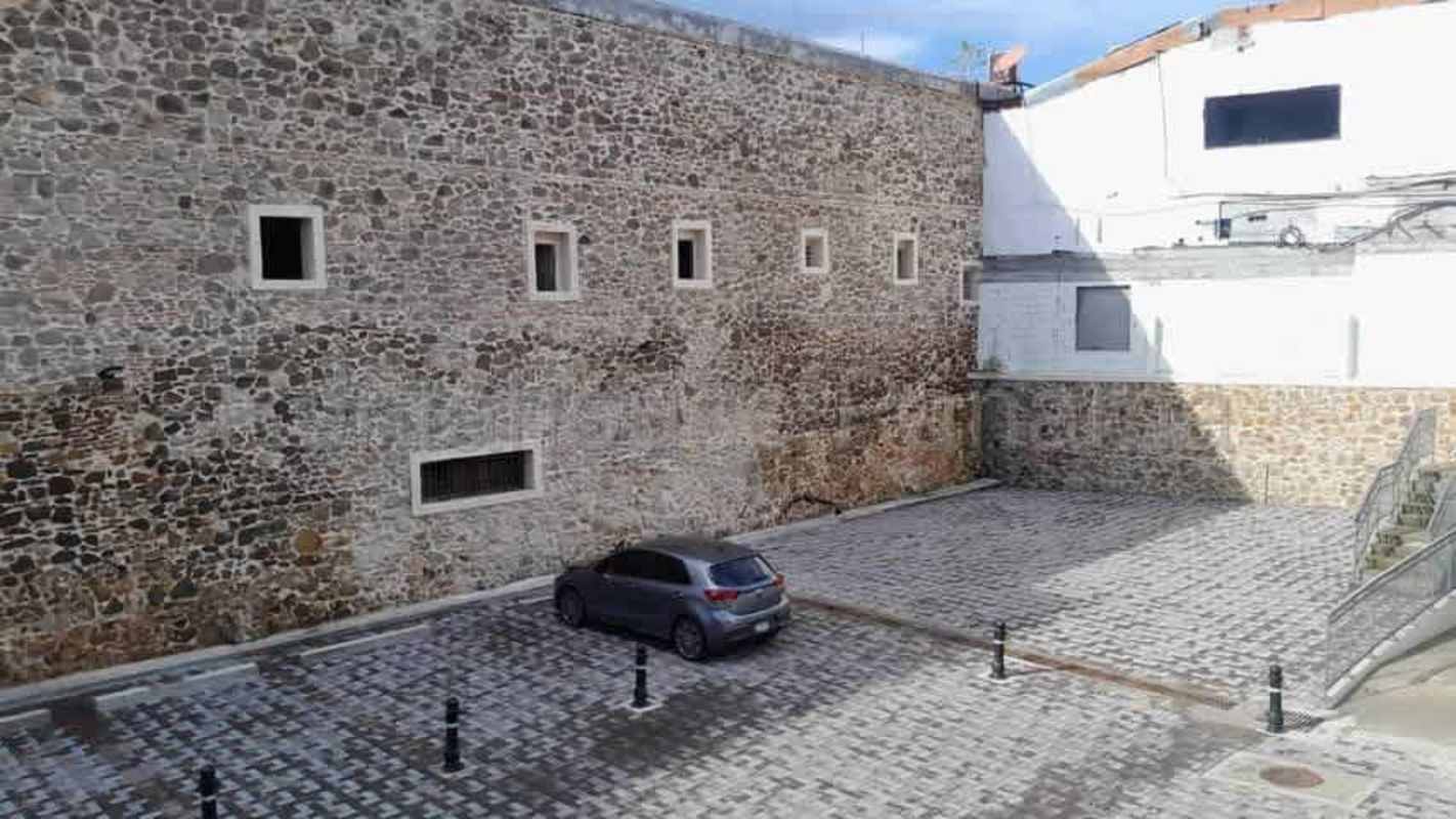 Balconies with colonial wrought iron Panama Casco Viejo retail lease space facade.