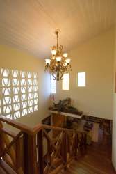 Covered restaurant terrace with ocean breeze dining area at La Casa Amarilla Hotel Punta Chame Panama