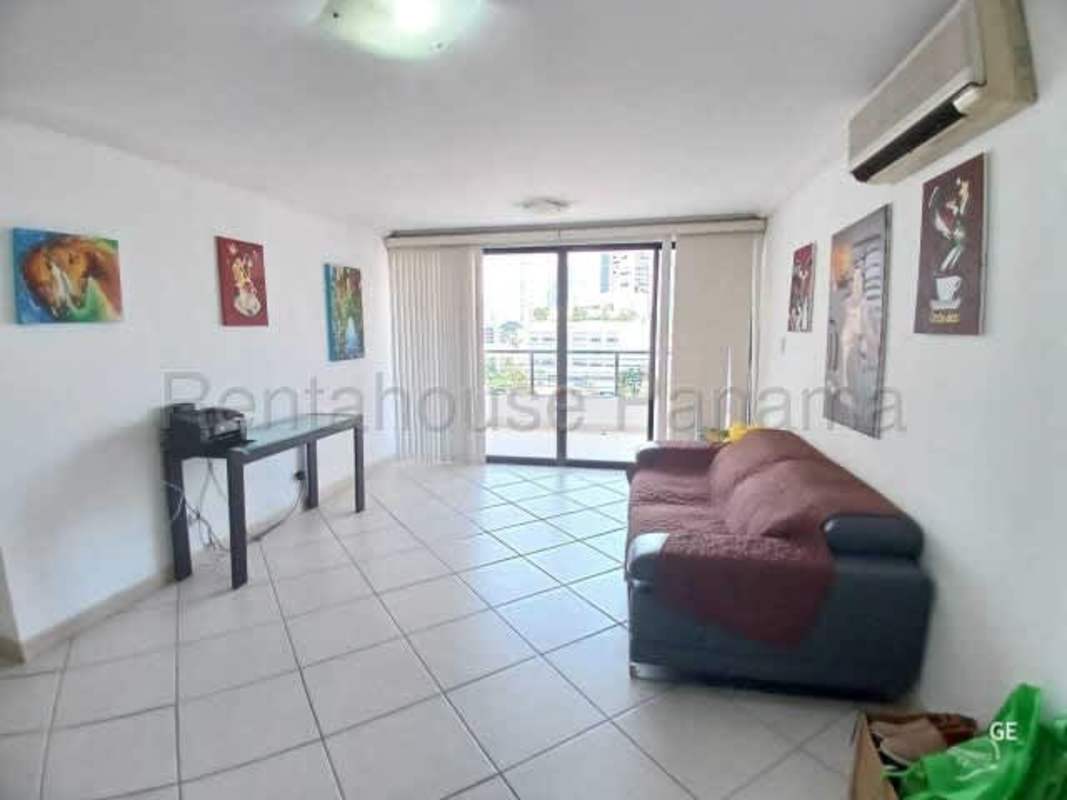 Modern kitchen with wood cabinets, tile backsplash, stainless appliances in Marbella PH Marina Tower