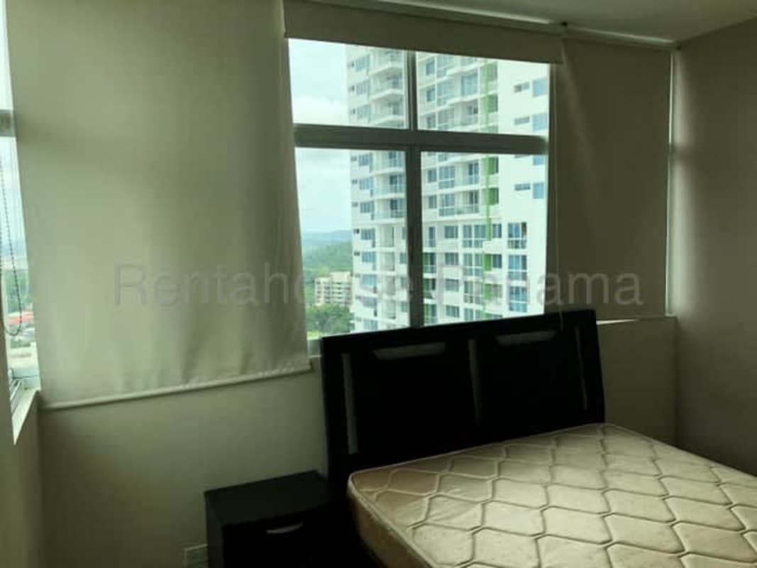 Bright bedroom with large corner windows at PH Vivendi Tower Panama City