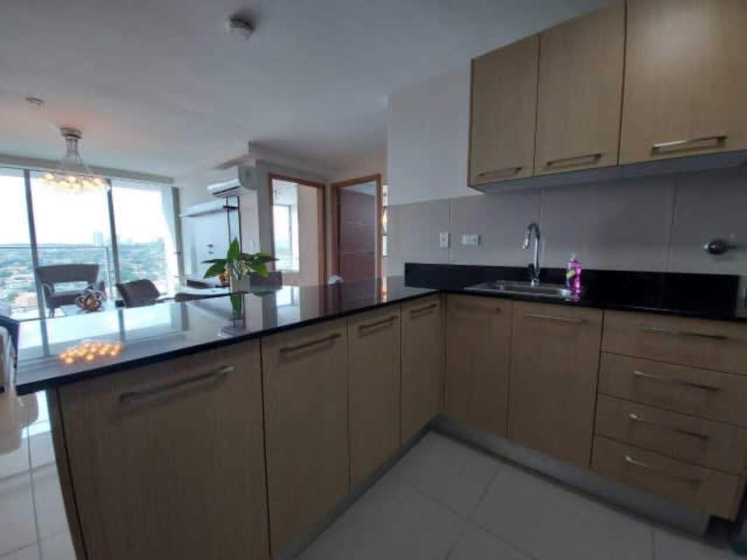 Bright living space with sliding doors to balcony in PH Torres de Castilla Vista Hermosa Panama