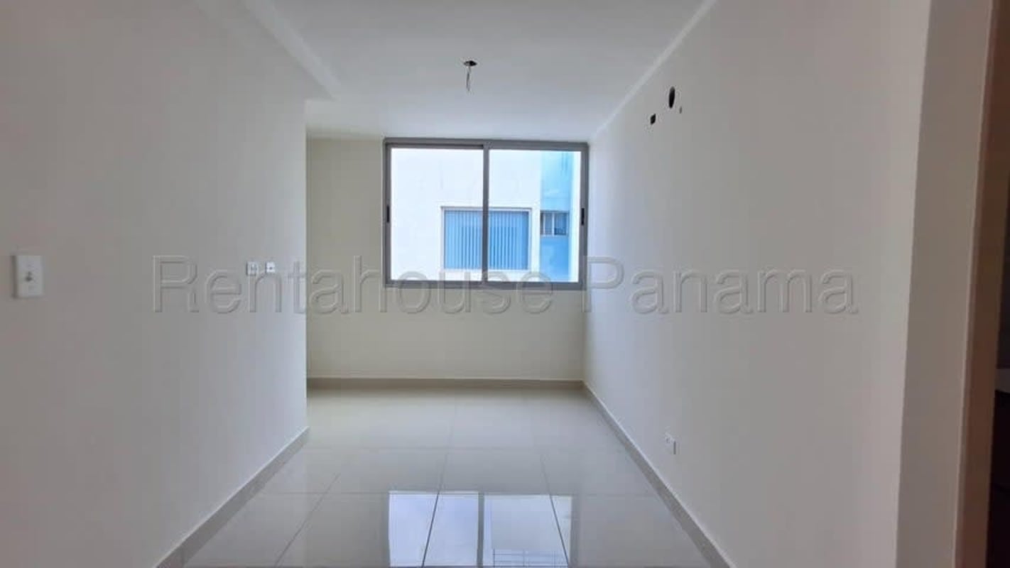 Outdoor playground equipment with city views on PH Torres de Castilla terrace Panama