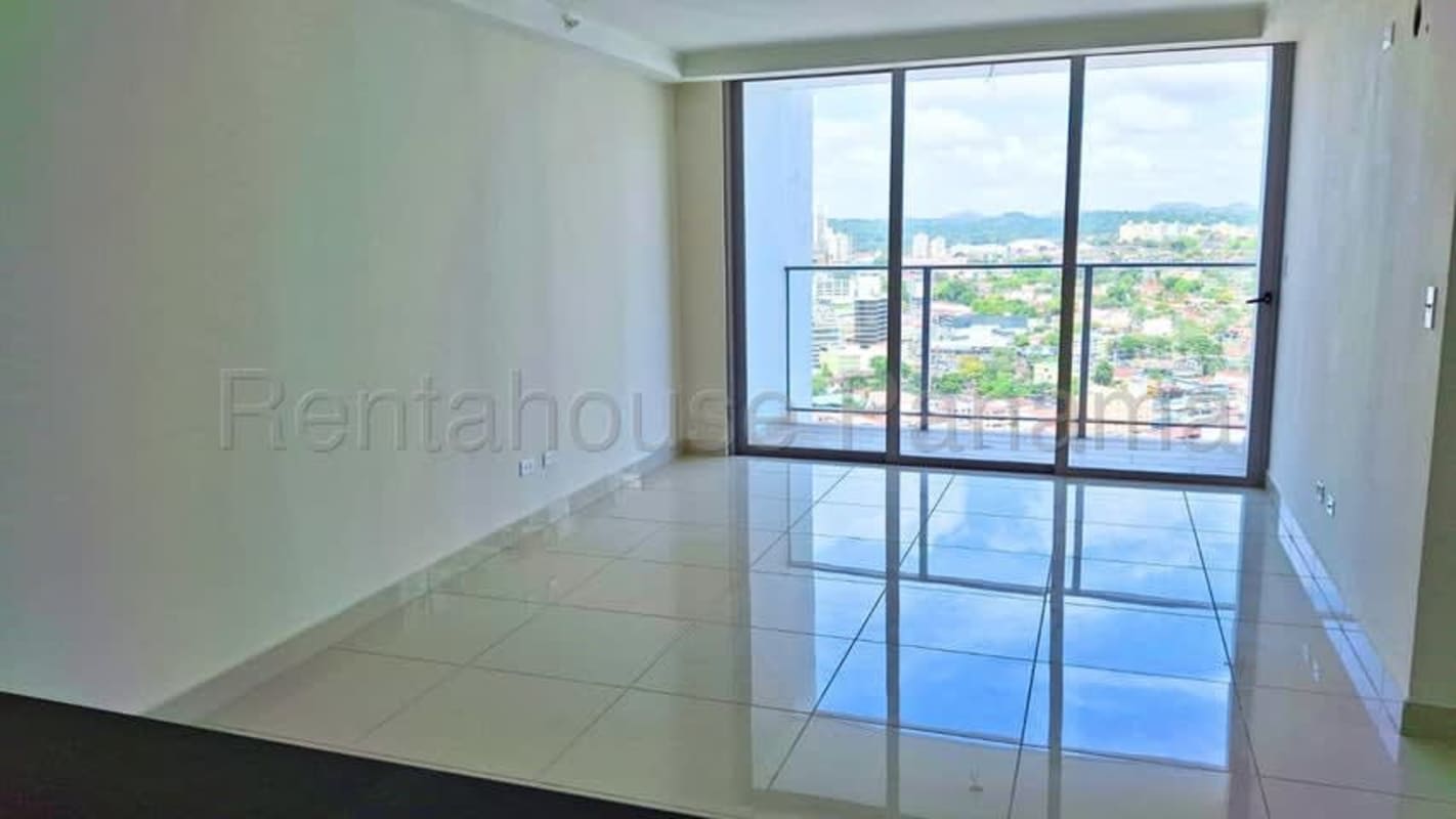 Open kitchen with granite countertop and wood cabinets apartment Panama City