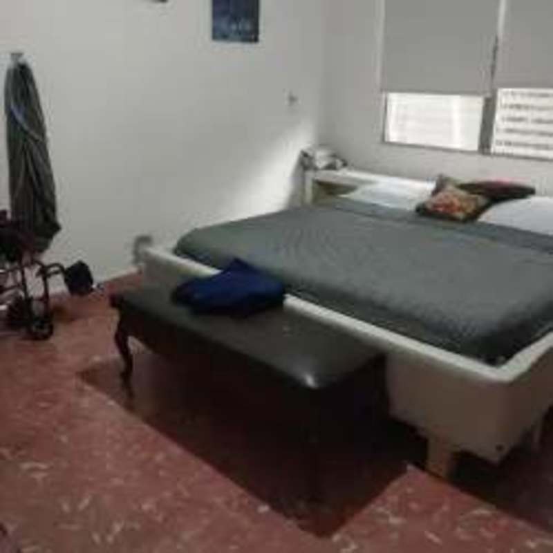 Minimalist bedroom with accessibility features marble floor Tocumen