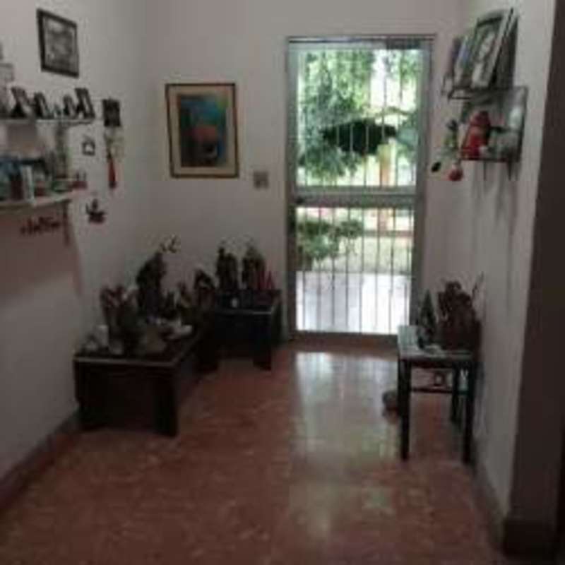 Entryway with metal door, shelves and garden view Tocumen Panama property