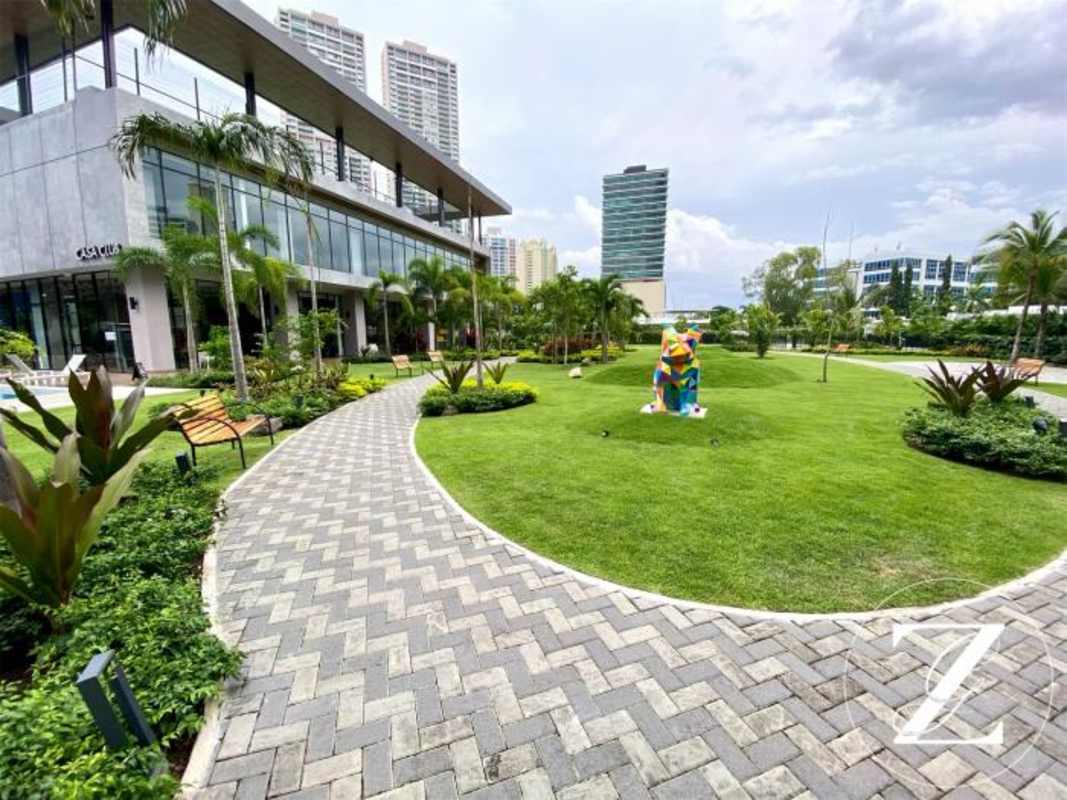 Bright living dining room with floor-to-ceiling windows ocean view Costa del Este