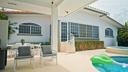 Minimalistic kitchen with quartz countertops and appliances in Playa Coronado beach house rental