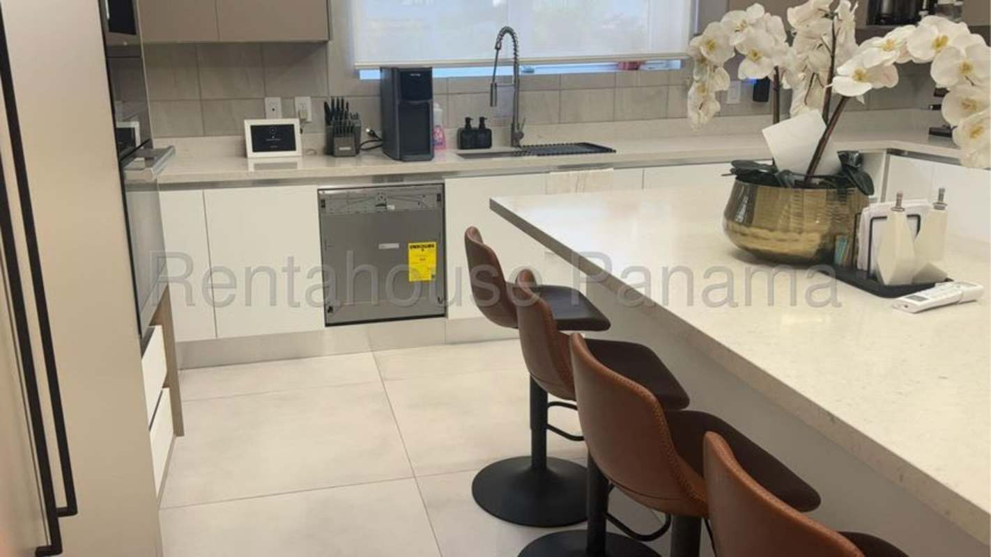 Spacious bedroom with large windows and built-in closets in Santa Maria rental Panama