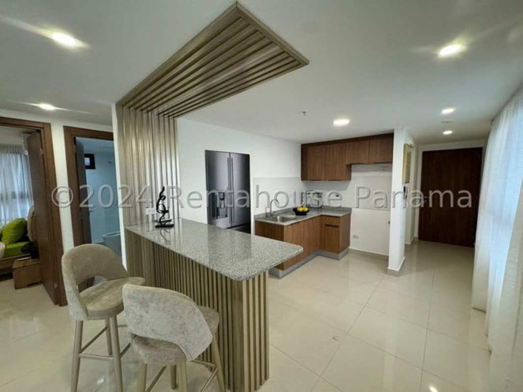 Bright hallway with tile floors leading to living space with sheer curtains at PH Vista Hermosa Panama