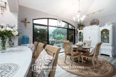 Two-story Mediterranean style house lush garden balcony Valle Escondido Boquete Panama