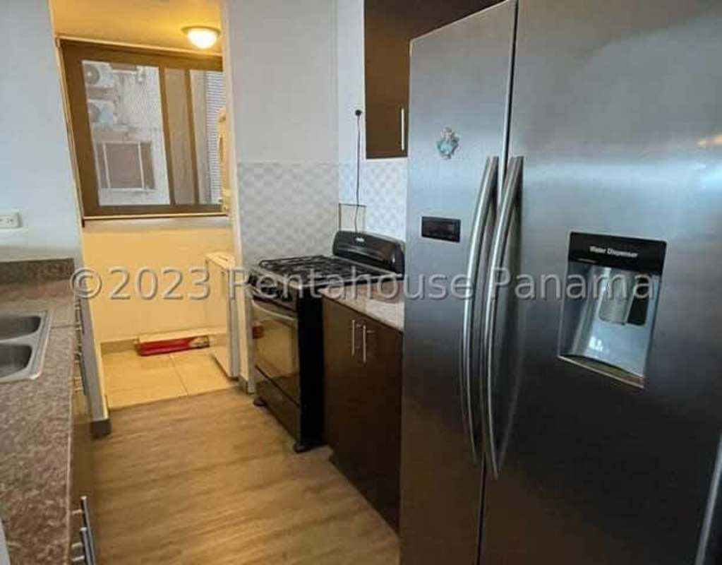 Contemporary kitchen with granite counters, gas stove, double sink in PH Parque Lefevre Panama