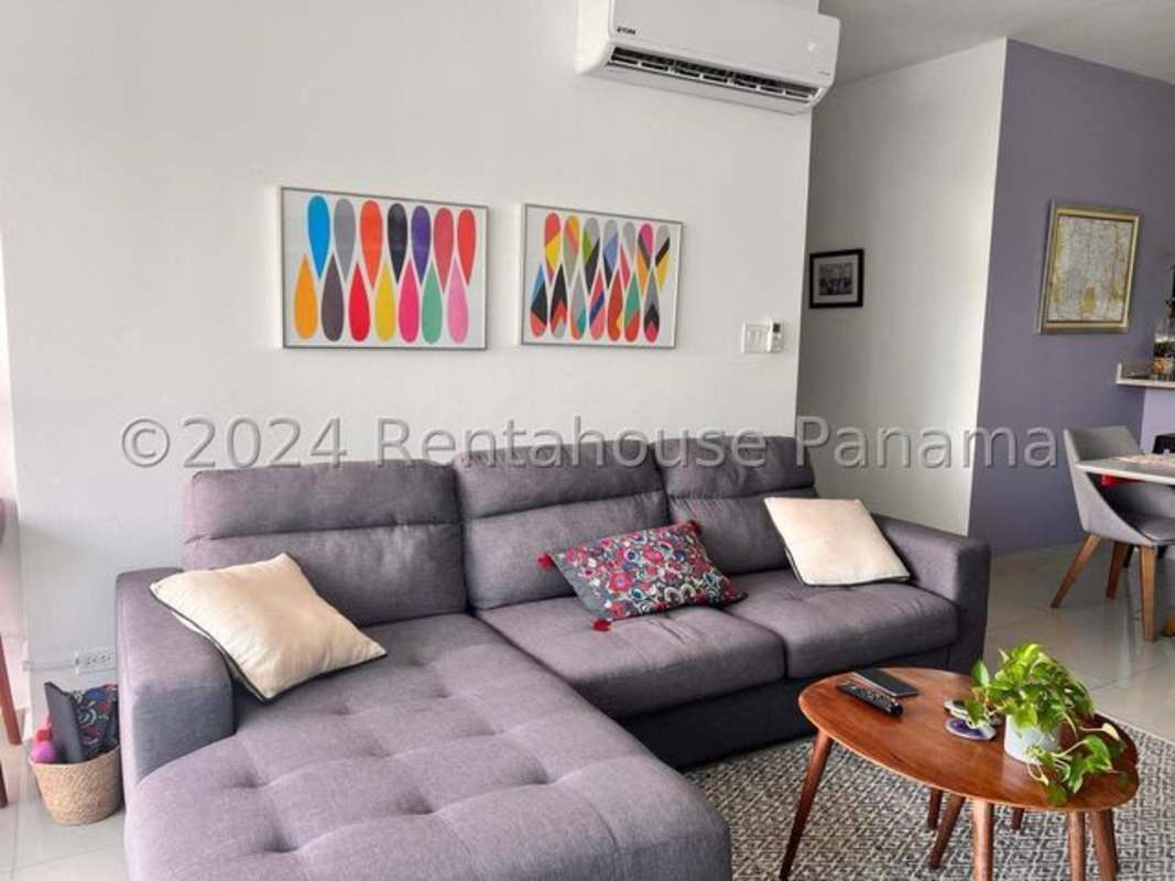 Modern bathroom with glass enclosed shower and vanity in El Cangrejo apartment