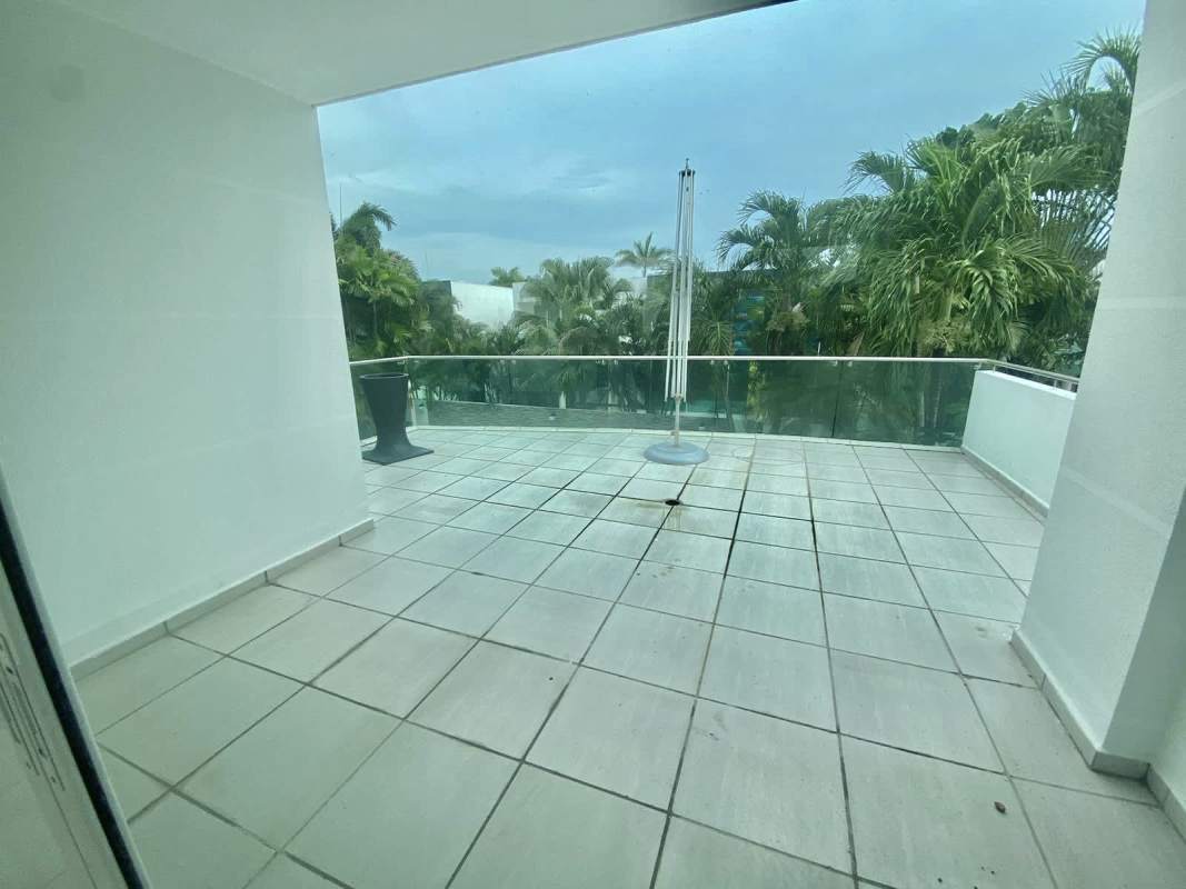 Bright bedroom with tile floors, natural light, split AC and closet Costa Esmeralda Panama