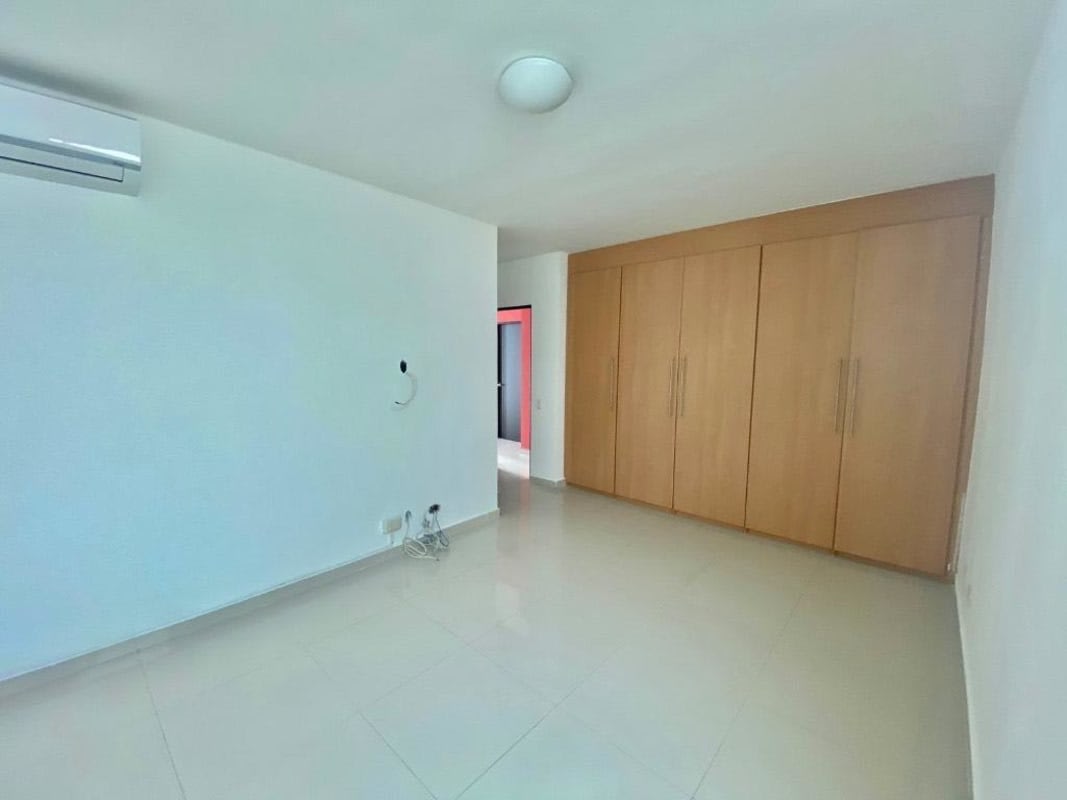 Kitchen with granite counters, center island, stainless range hood, large windows Costa Esmeralda Panama