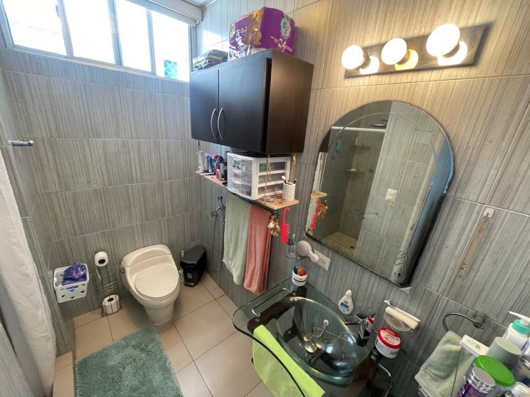 Contemporary kitchen with granite countertops and ample cabinets at PH Terramar San Francisco Panama City