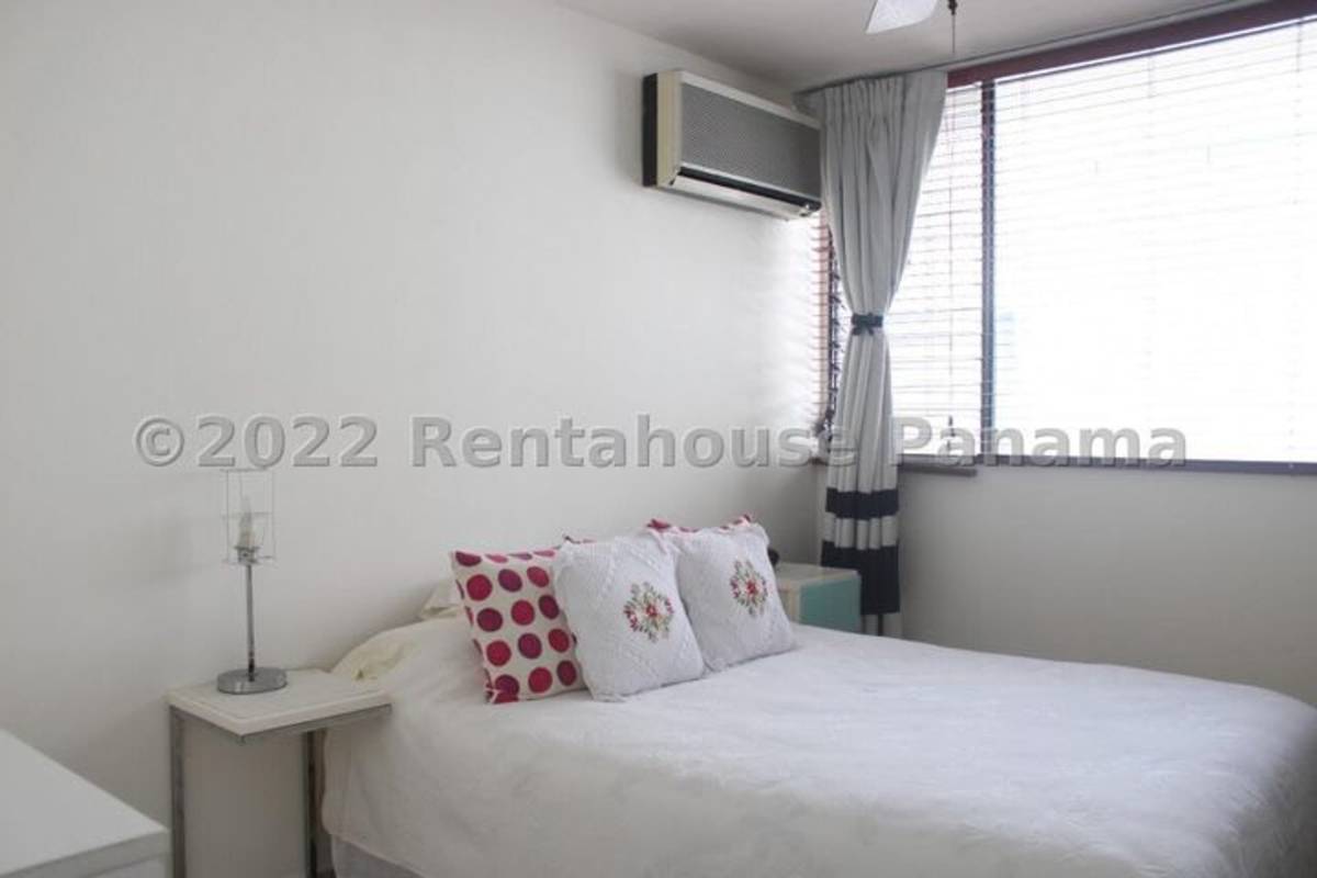 Minimalist bedroom with large window, split AC, curtains PH Marbella 25 Bella Vista