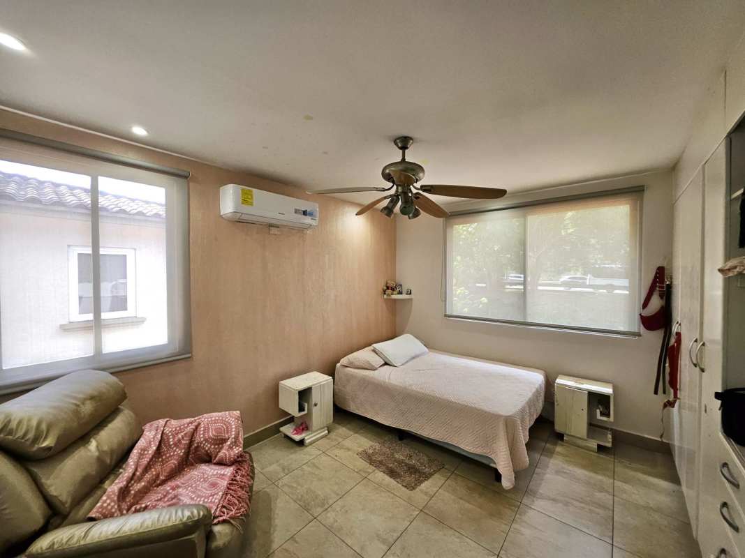 Bright family dining space with large windows and porcelain tiles in Paseo Dorado Condado del Rey