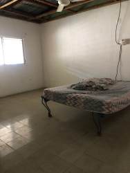 Interior hallway with doors and tile floor inside large house in Montijo Panama for sale