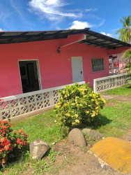 Pink single-family tropical bungalow with fenced garden in Montijo Veraguas Panama