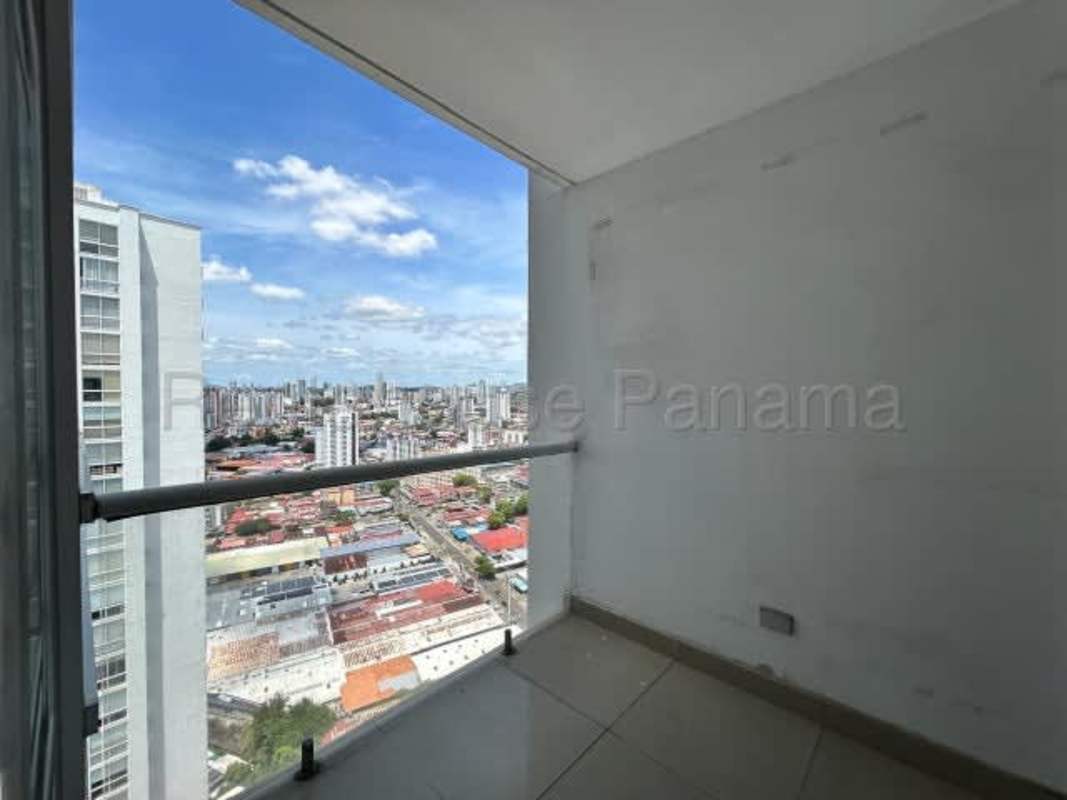 Bathroom with vessel sinks, mirror, walk-in shower for sale in Coco del Mar Panama apartment