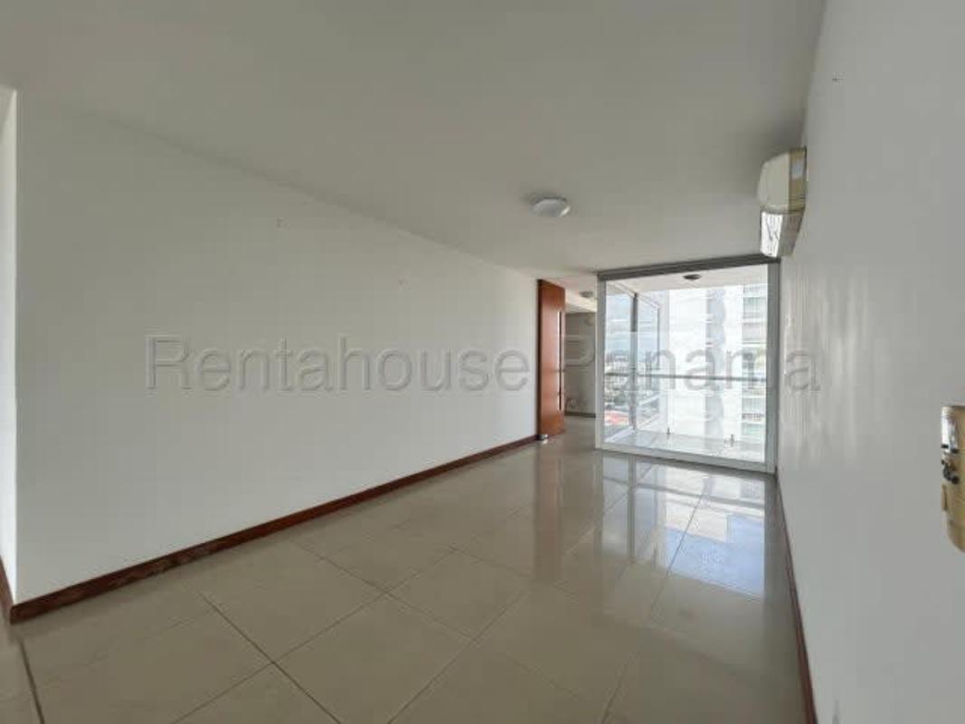 Unfurnished master bedroom with large windows and ocean panorama in Coco del Mar Panama