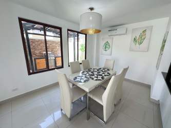 Compact half-bath with modern design and storage Senderos de Bambú Panama