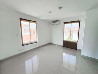 Spacious bedroom with large windows, tiled floors in Senderos de Bambú Arraiján Panama