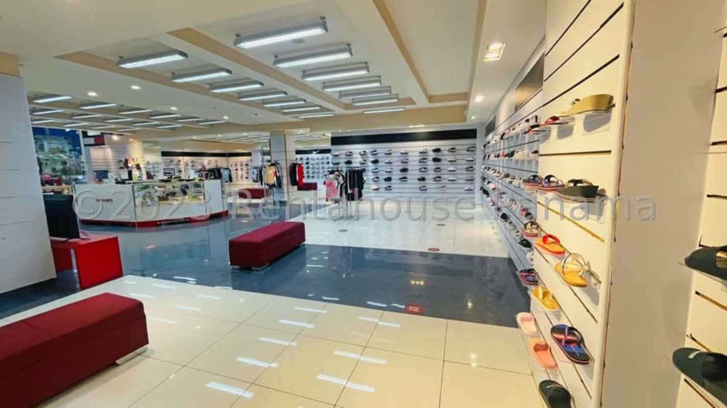 Well-lit spacious commercial retail store interior with shelving in Panama