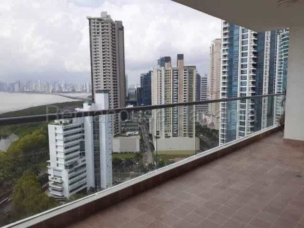 Large private balcony with glass railings overlooking Pacific Ocean from PH Paramount Panama City