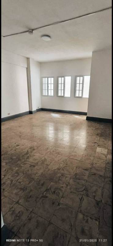 Open living and dining room with tile floors and balcony in PH Via Veneto El Cangrejo Panama